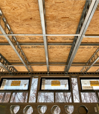 Huber Zip OSB sheathing as metal roofing underlayment on am-cor roof panel joists