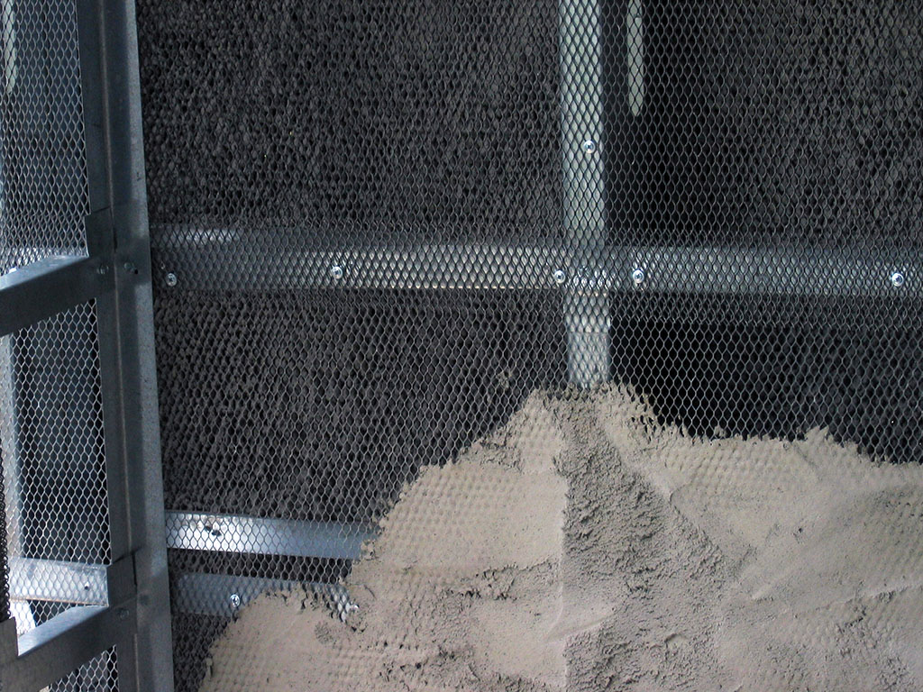 amcorite Ferrocement used on both sides of an am-cor Wall Panel for: increased fire rating, ballistics-resistance, superior strength