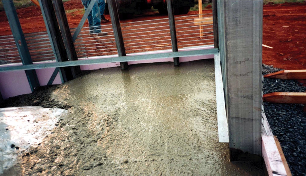 Disaster-resistance is achieved by creating a solid unit of: footer, walls, floor slab